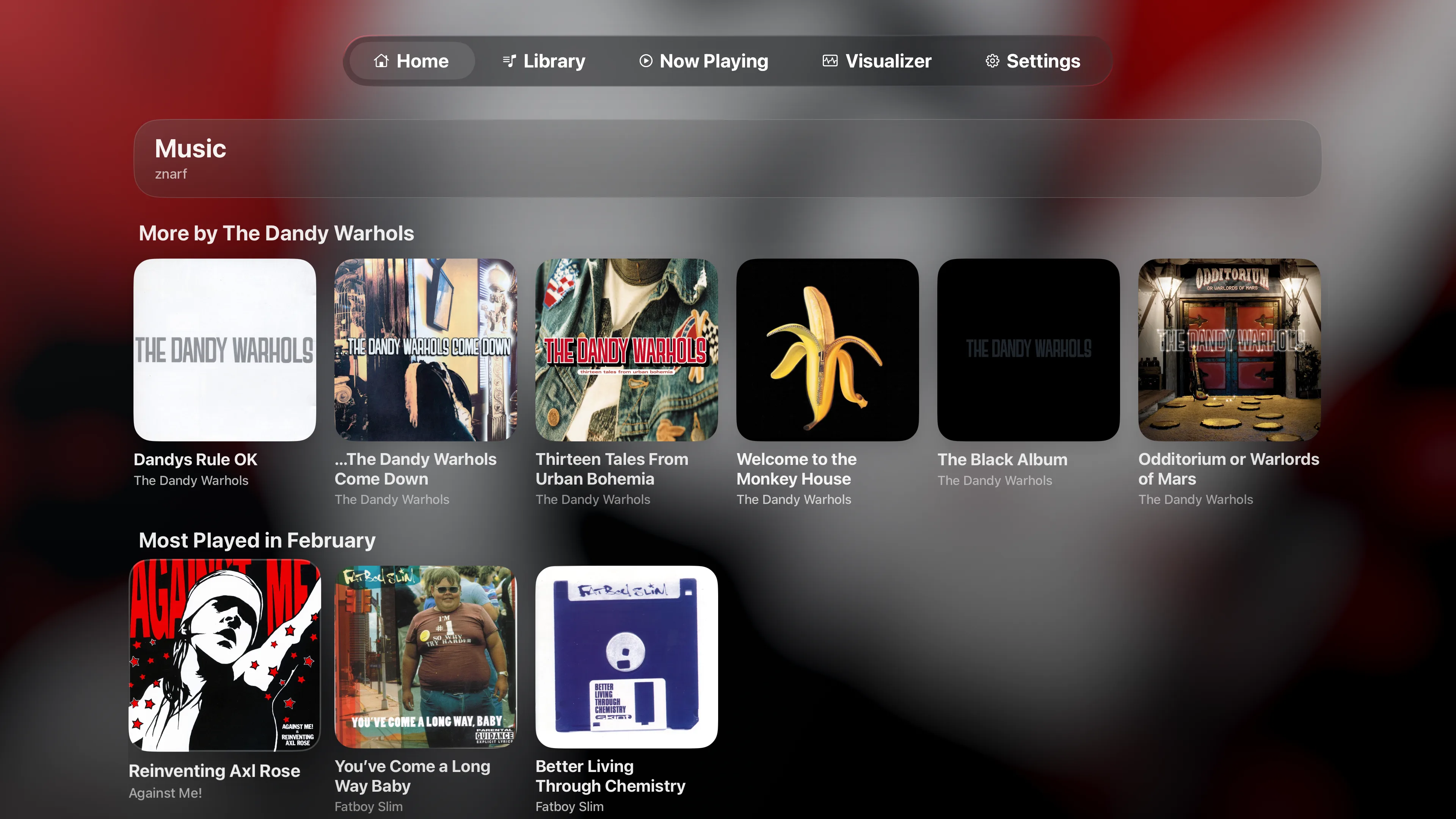 The Home screen in Playris on Apple TV, with rows of albums by The Dandy Warhols and most played records